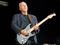 Une image contenant instrument de musique, personne, habits, musique Le contenu généré par l'IA peut être incorrect. Une image contenant instrument de musique, personne, habits, musique Le contenu généré par l'IA peut être incorrect.